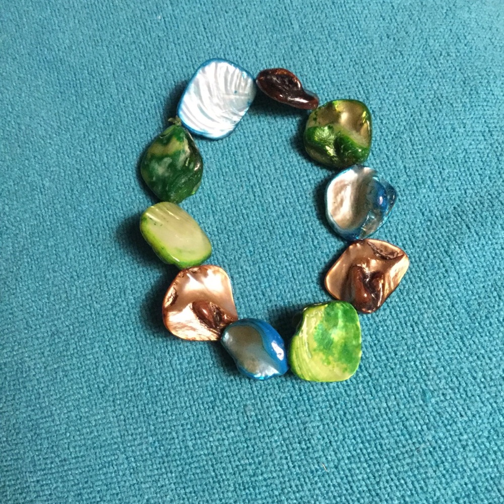 Fun bracelet. Stretchable w/ colorful stones.